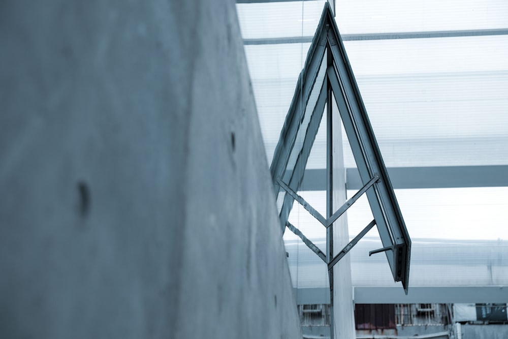 a flag hanging from the side of a building