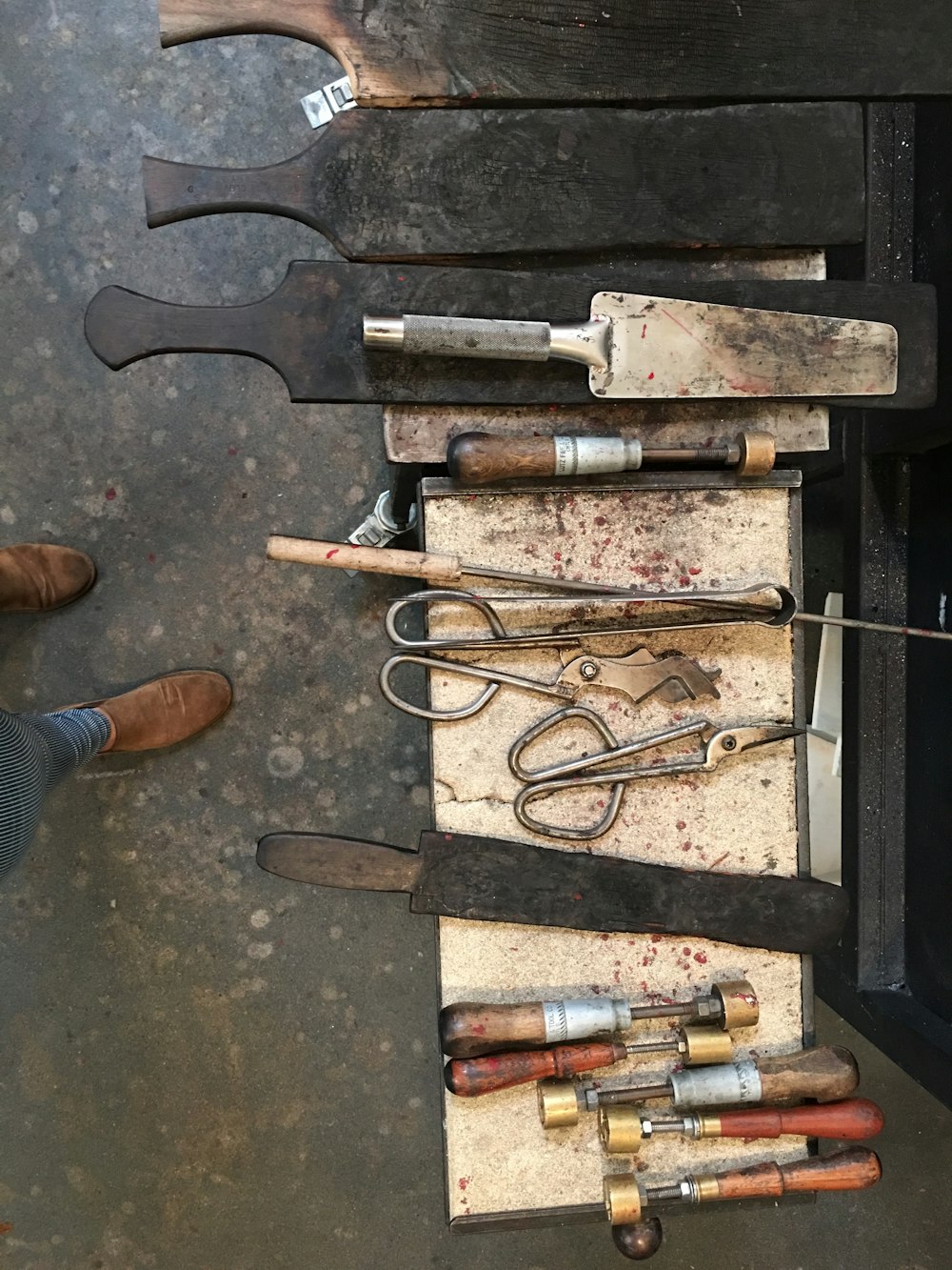 assorted tools on bench