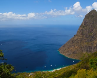 aerial photography of St.Lucia Piton under cloudy sky