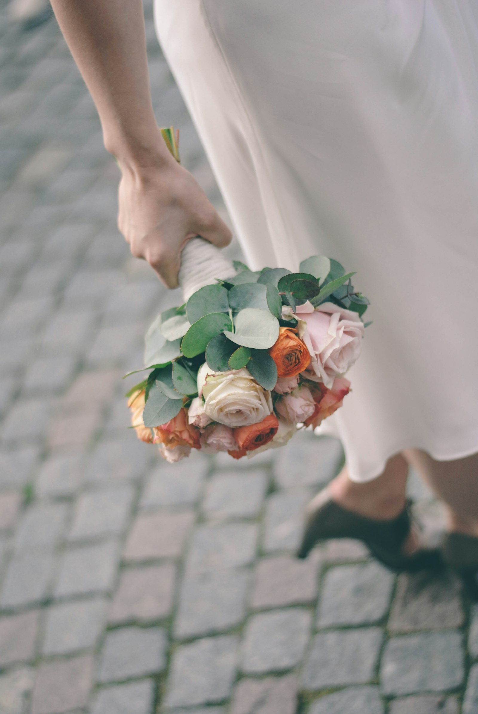 Nikon D3000 + Nikon AF-S Nikkor 50mm F1.8G sample photo. Person holding flower arrangement photography