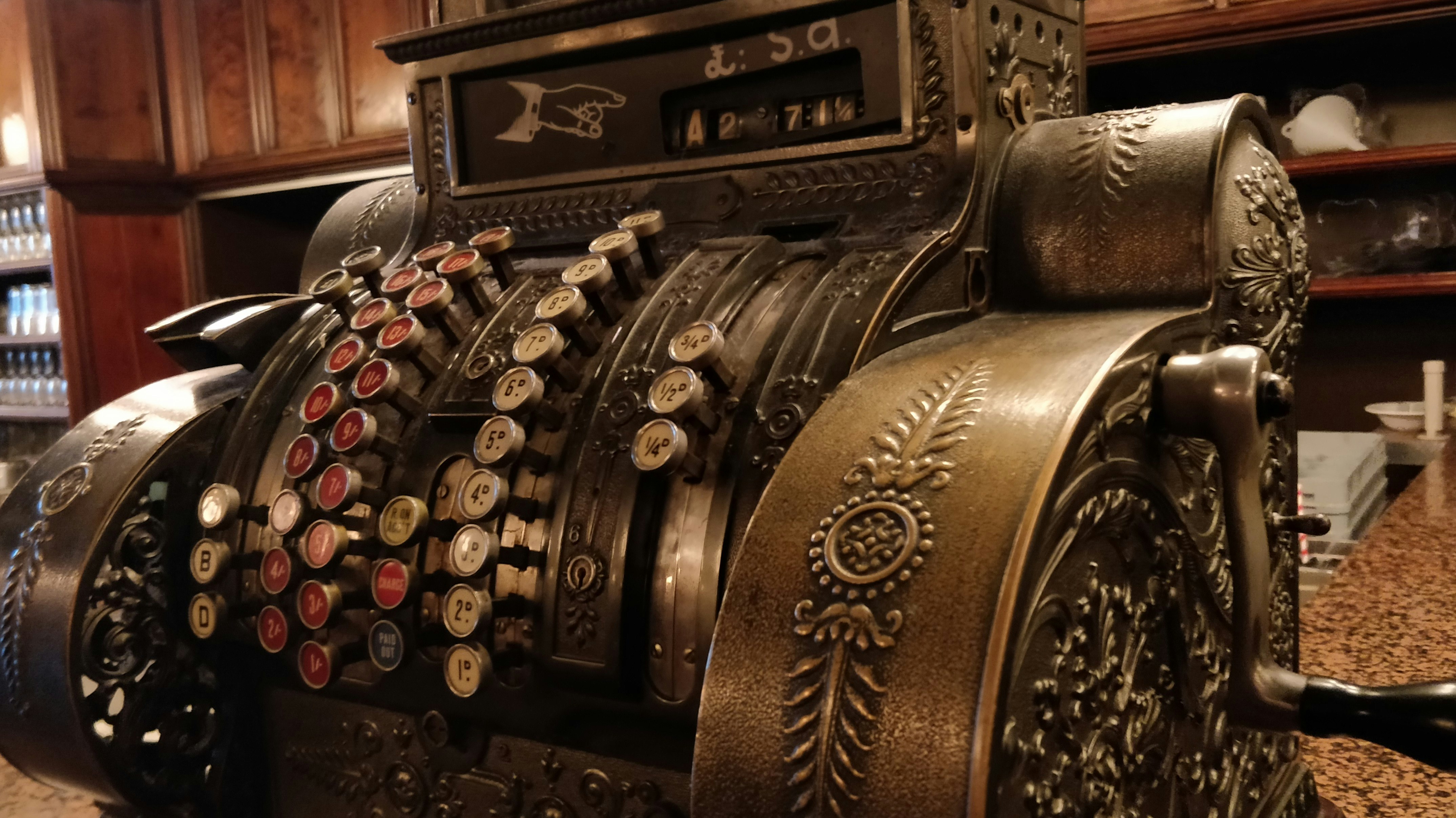 I love beautiful old machines and this cash register in a restaurant in Perth, Scotland really caught my eye. I love the voluptuousness and the detail lavished on it.
