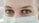 closeup photo of woman's eye wearing mask