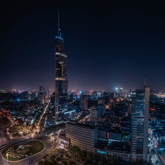 city skyline during night time in Zifeng Tower China