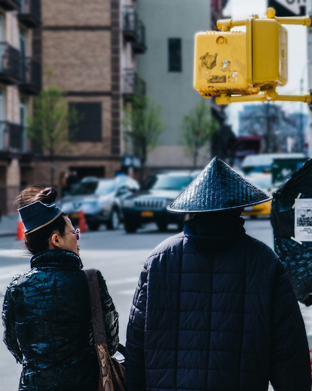 two person walking on street