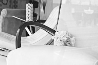 Close-up of refined textures and monochrome accents reflecting quiet elegance in a modern office setting.