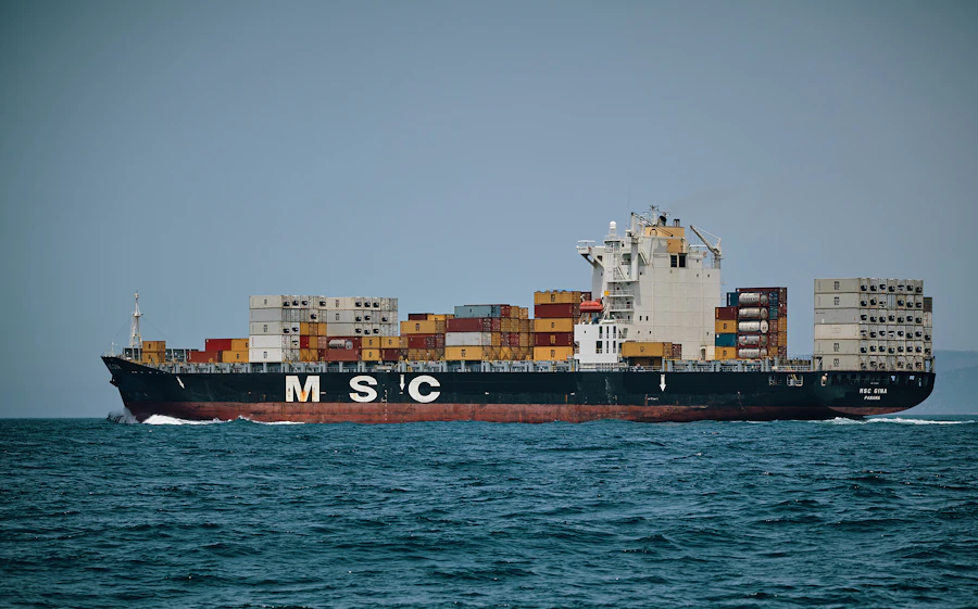 Container ship carrying cargo across the sea