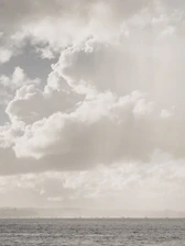 ocean under clouds