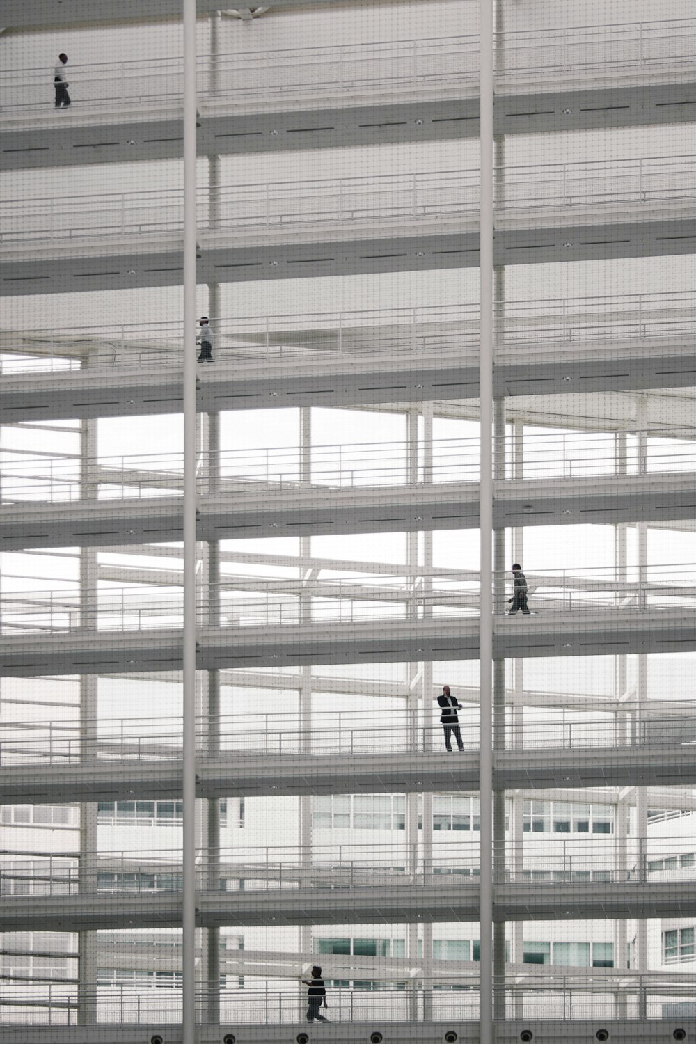 person walking on a hallway in building