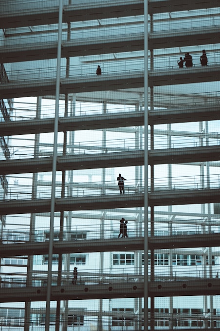 low-angle photography of people on building