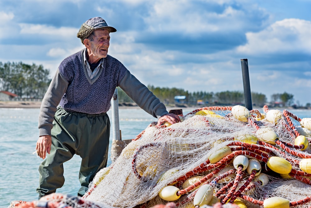 man holding fishing net