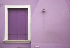 purple wall and white wooden window wall decor
