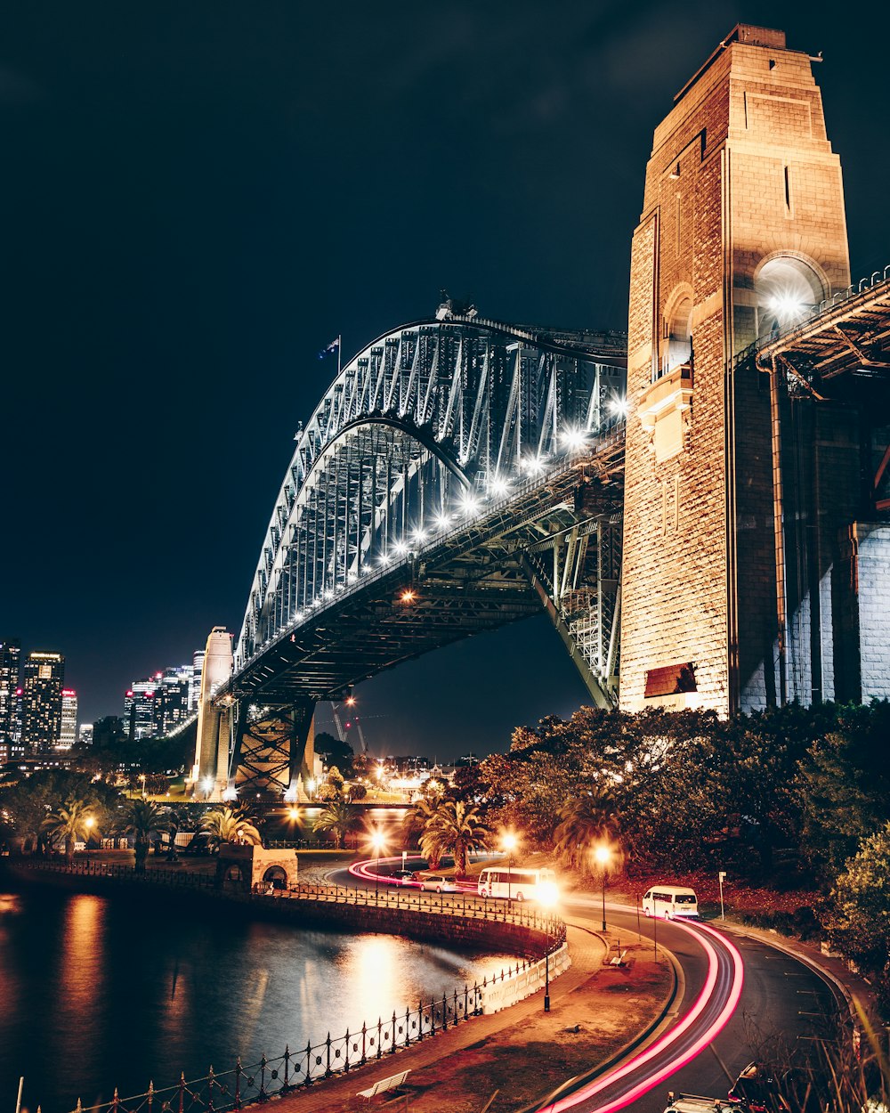 black and brown concrete bridge during night time