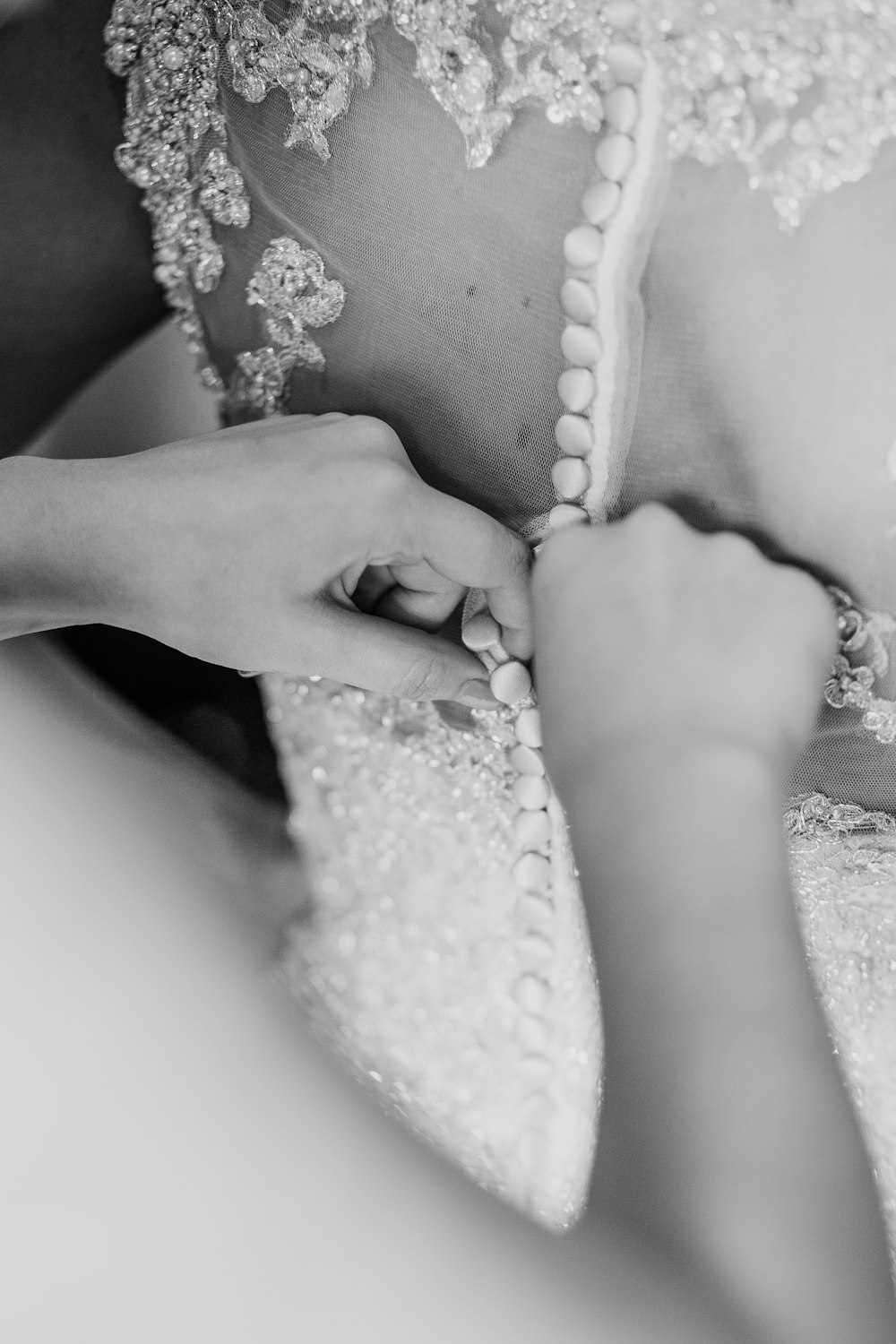 grayscale photo of beaded lace gown