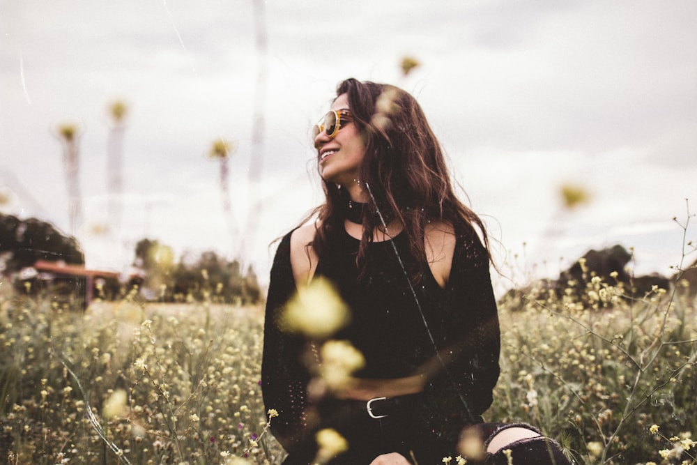 woman looking left with flowers on background