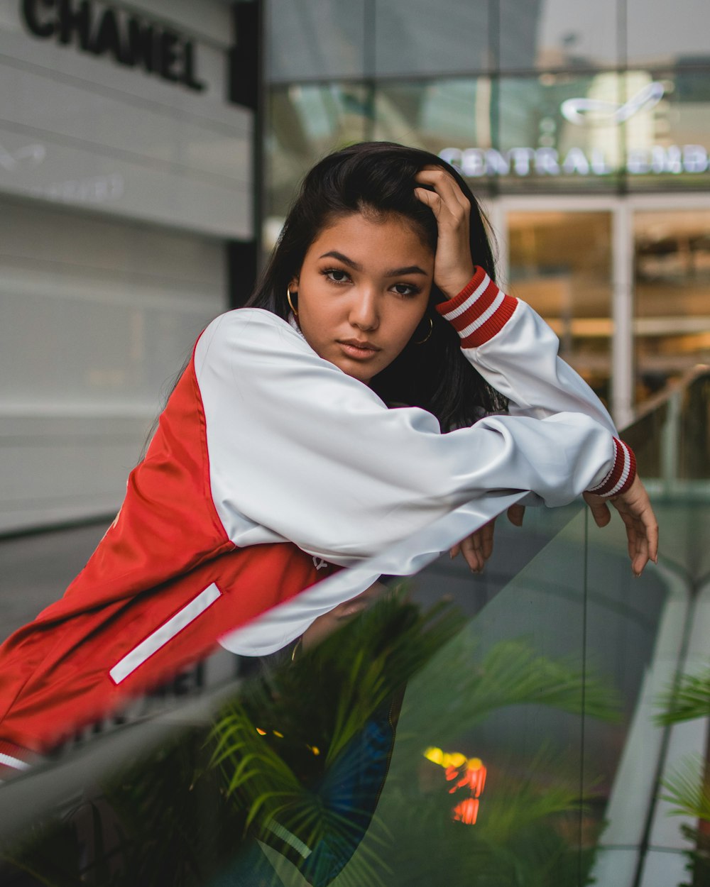 woman on red and white letterman jacket