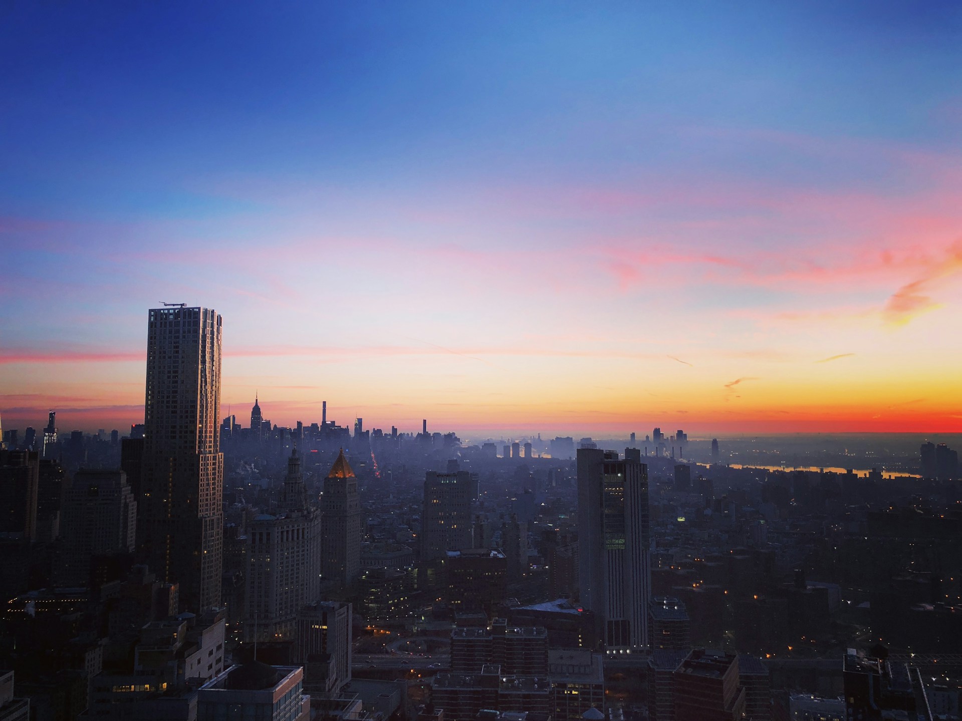 aerial photography of high rise buildings during golden hour