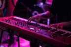 person playing electronic keyboard