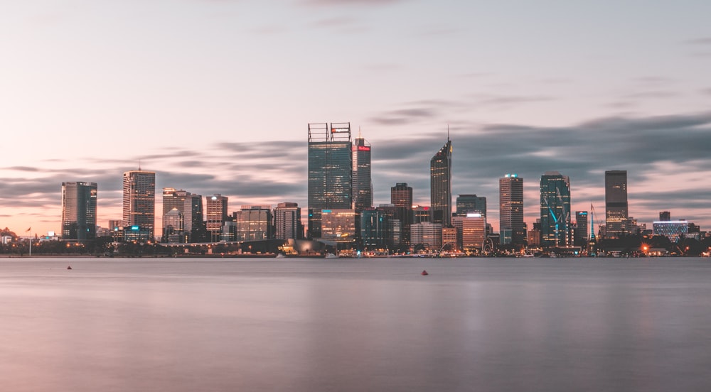 city near body of water during daytime