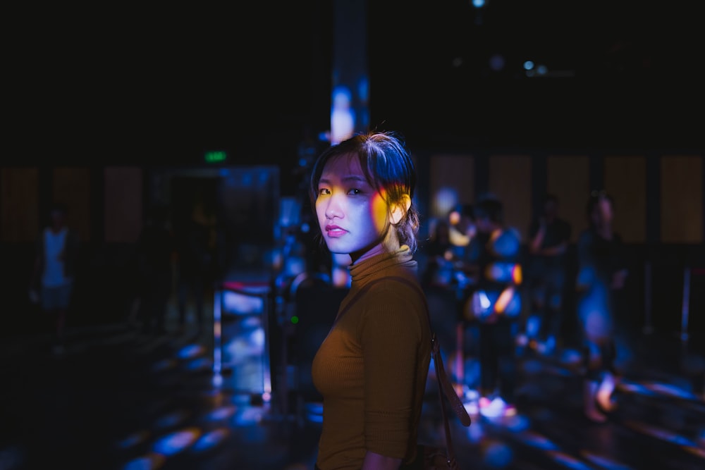 selective focus photo of woman standing