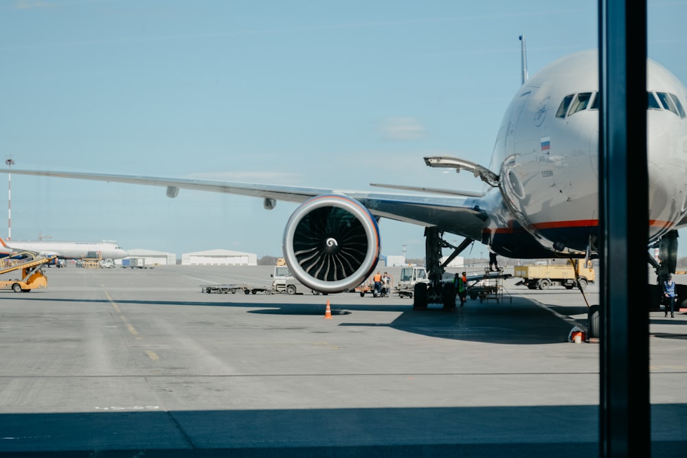 white airliner on runway