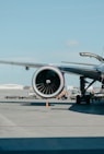 white airliner on runway