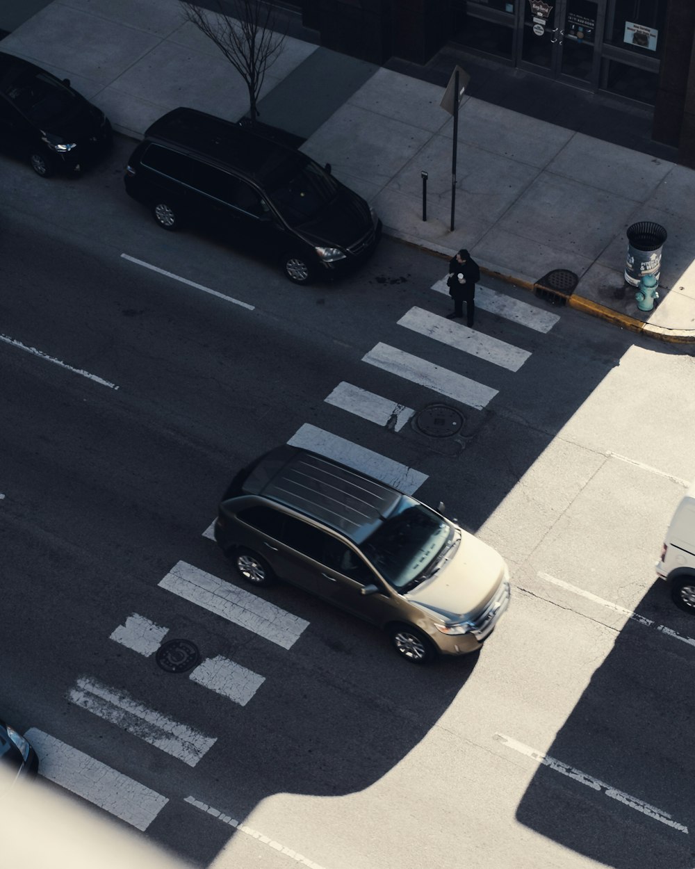 parked car near building during daytime