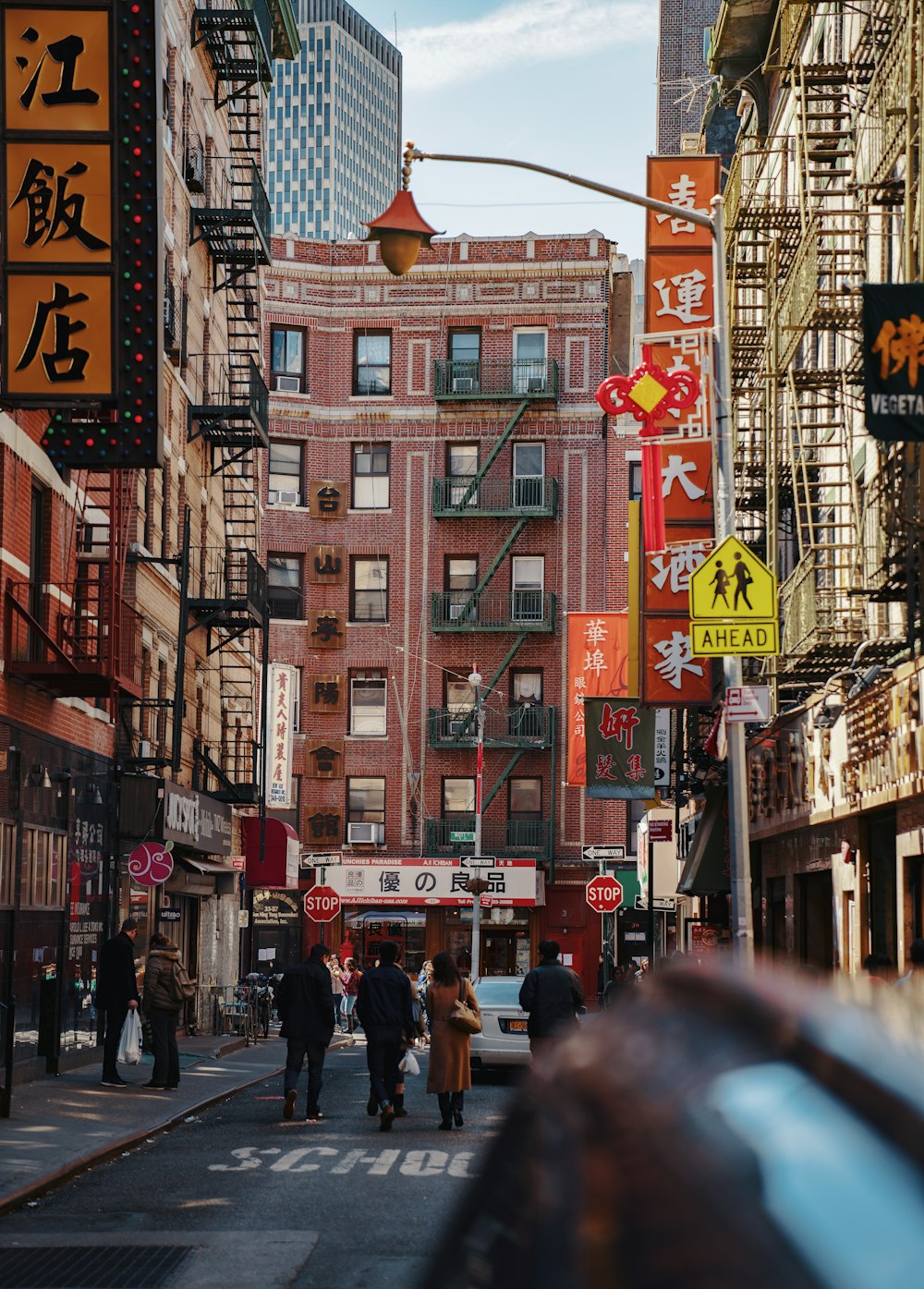 people walks on street during daytime