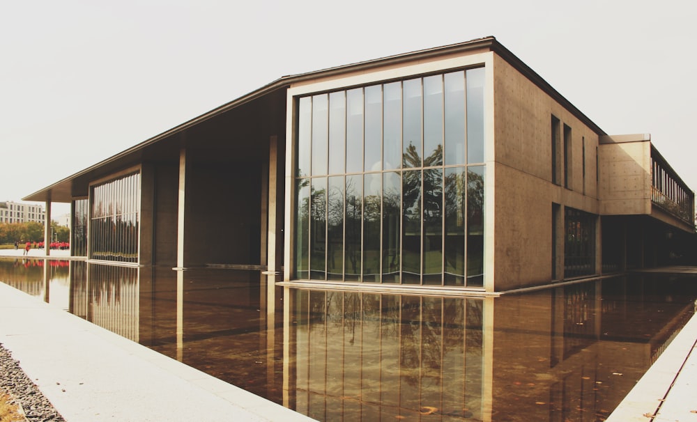 gray concrete building under cloudy sky during daytime