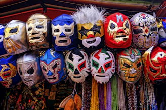 assorted-color of masks hanged on rod