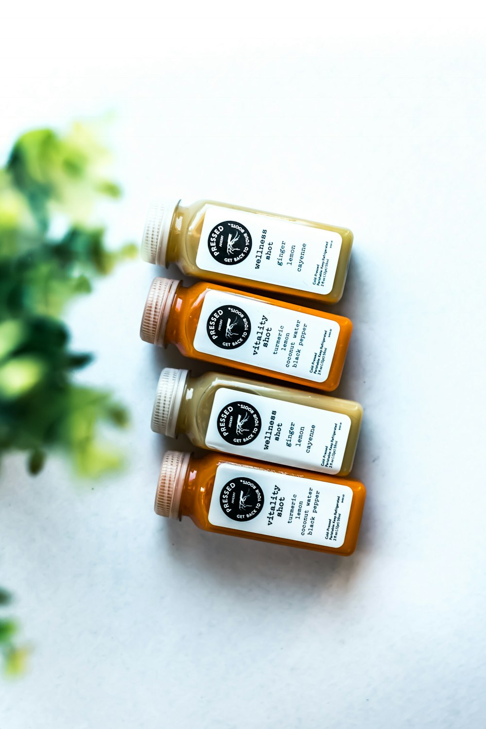 wellness shot and vitality shot glass bottles