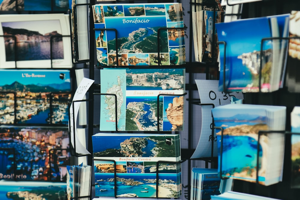 selective focus photography of landmarks card on rack