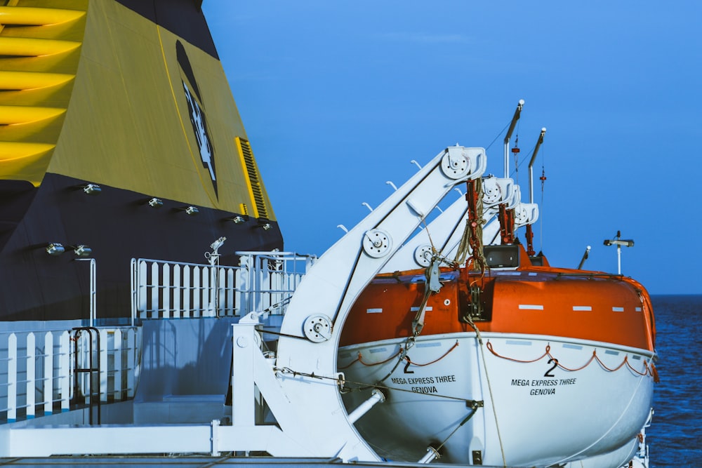 white and red watercraft