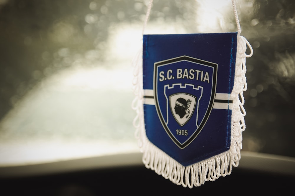 Selective Focus Photography Of White And Blue S C Bastia Crossbody Bag Photo Free Bastia Image On Unsplash