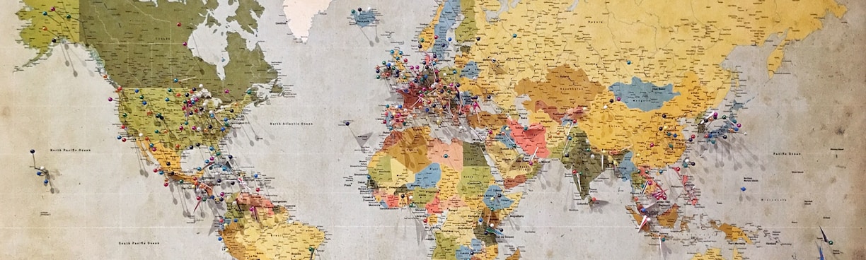 blue, green, and yellow world map