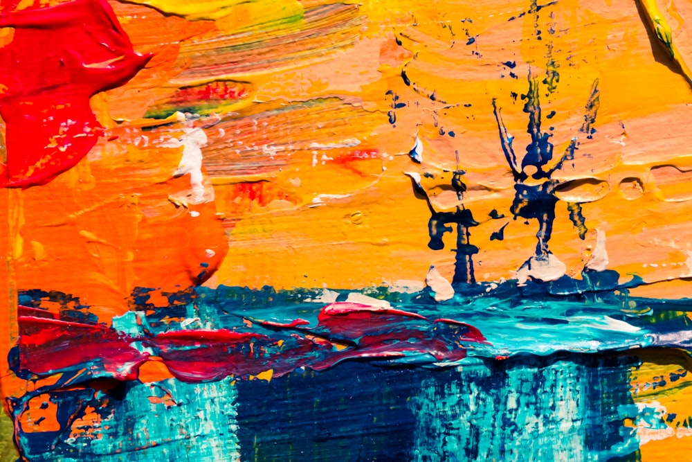 Peinture abstraite orange, rouge et bleu