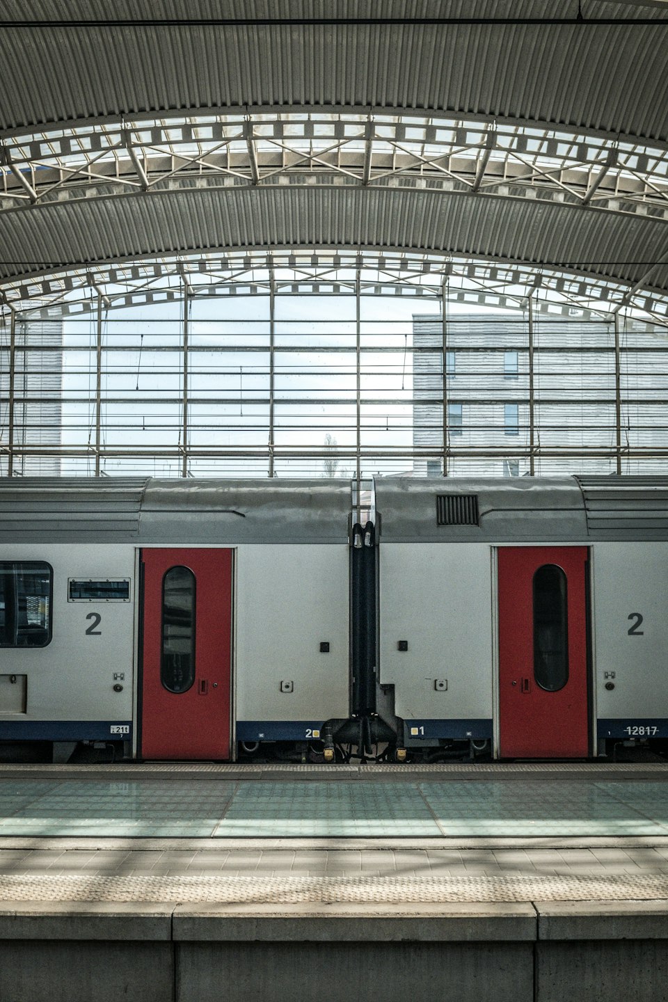 A Belgian intercity train waiting at a station platform