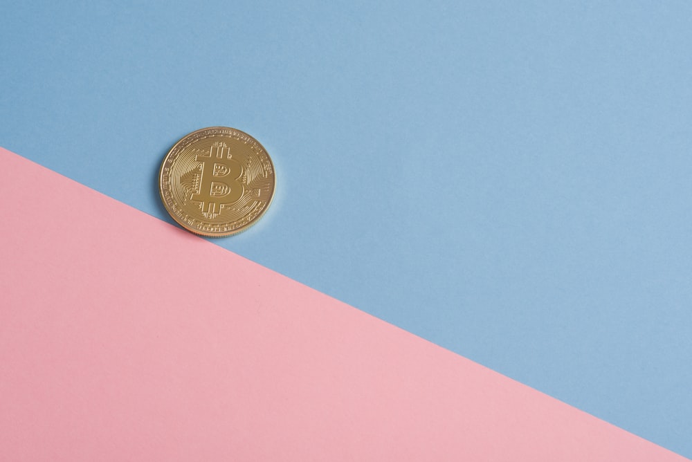 round gold-colored coin