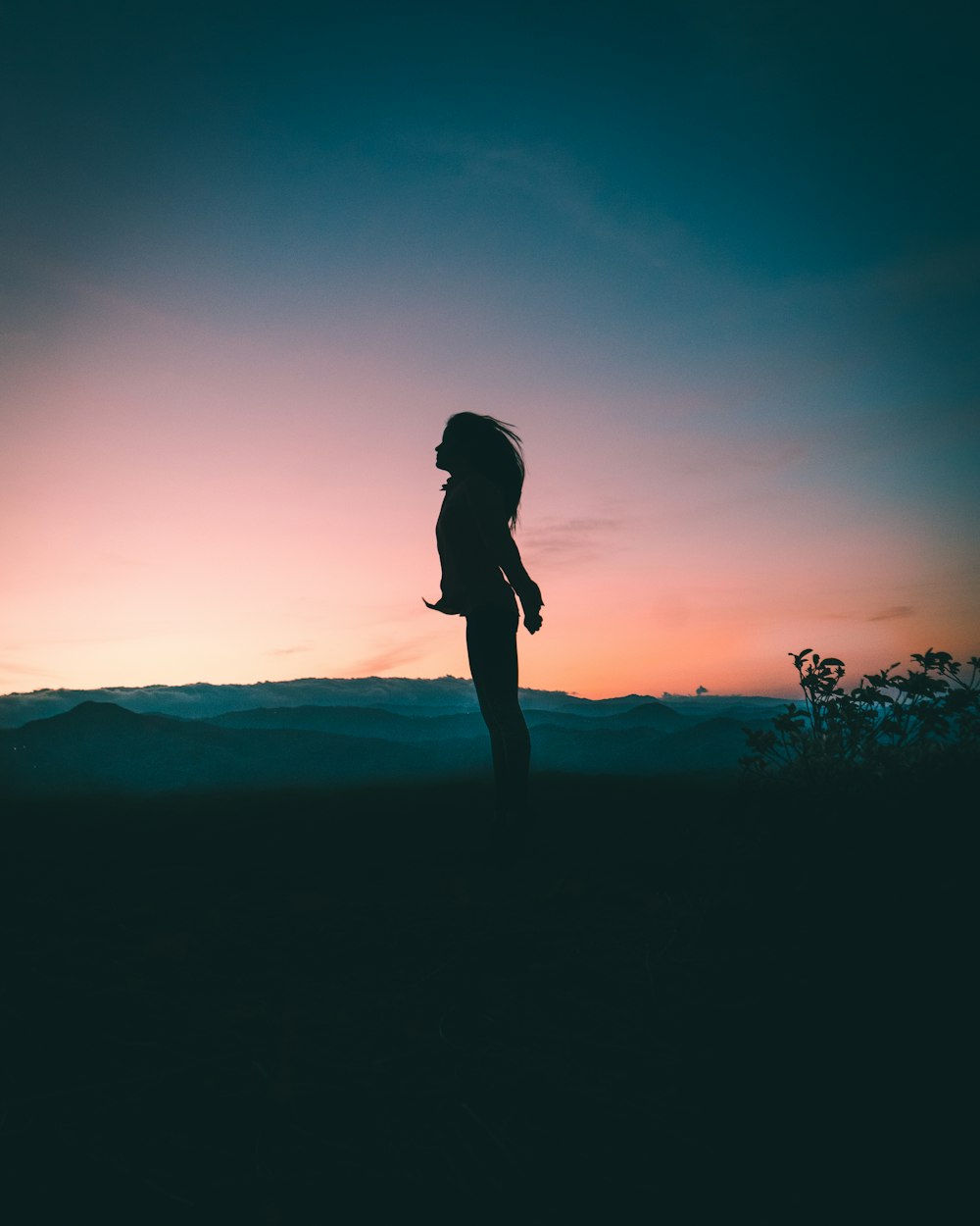 silhouette of woman jumping