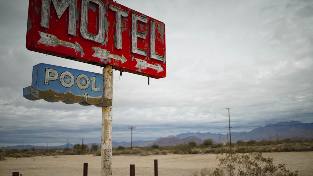red motel signage in shallow focus