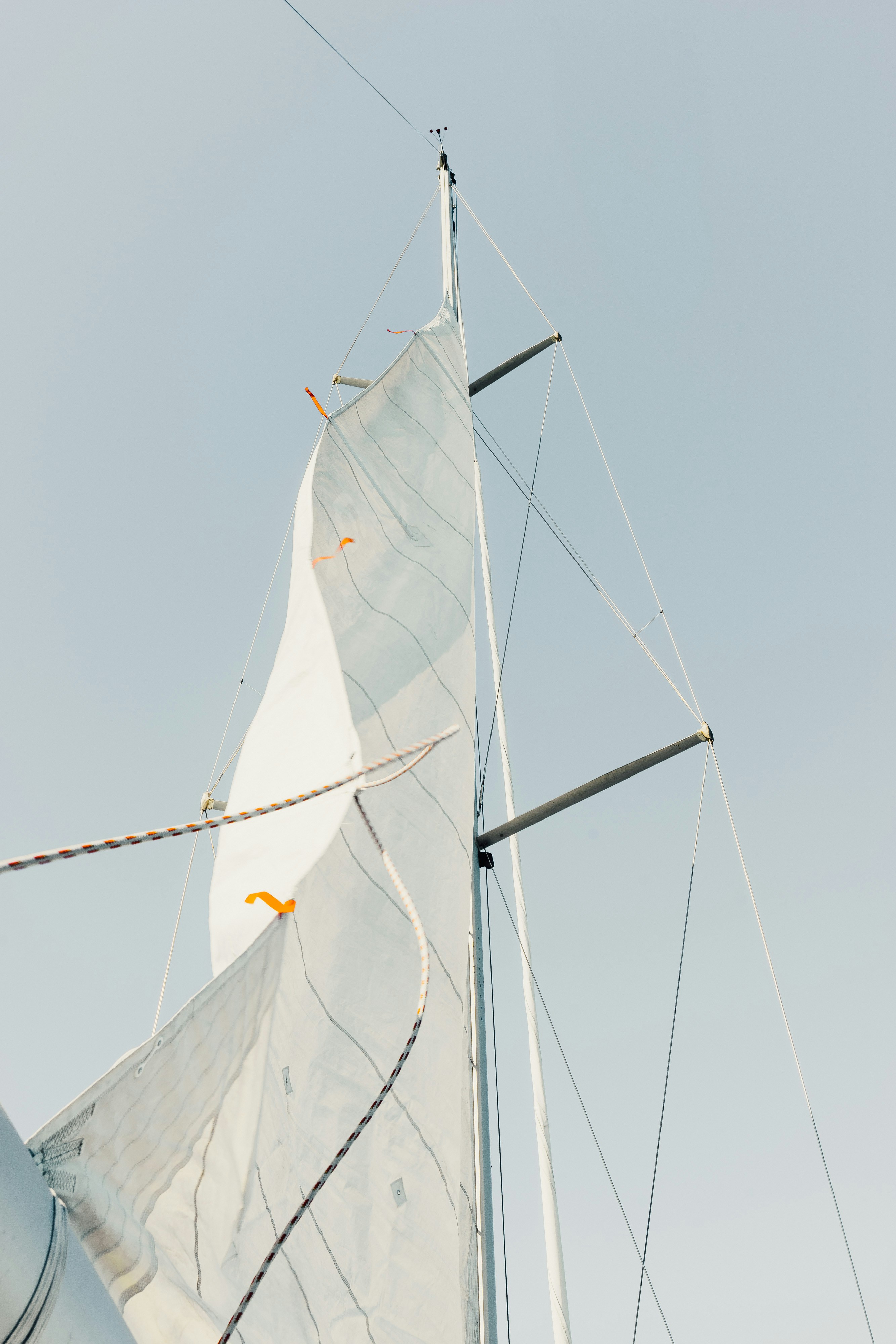 low angle photo of white sail