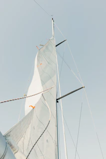 low angle photo of white sail