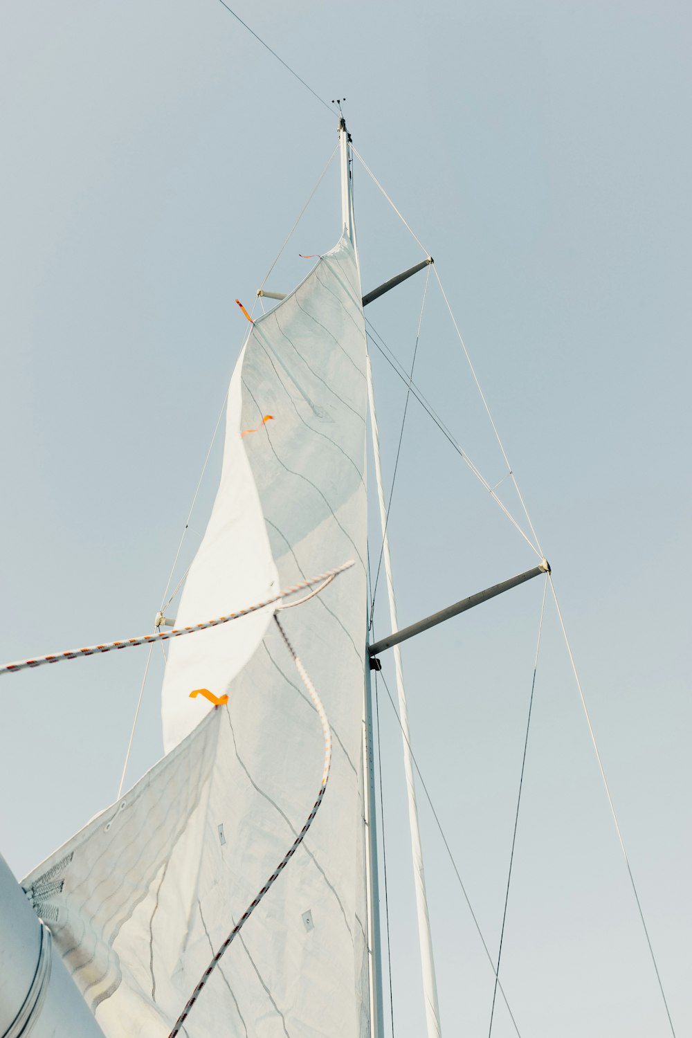 low angle photo of white sail