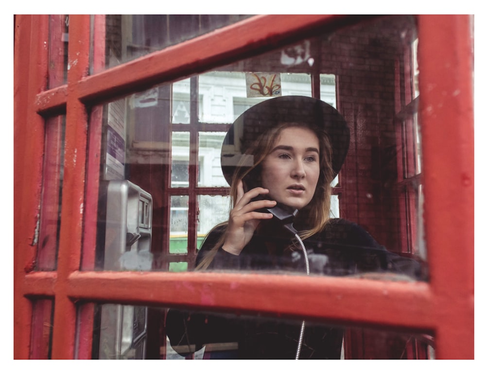 woman taking on the phone