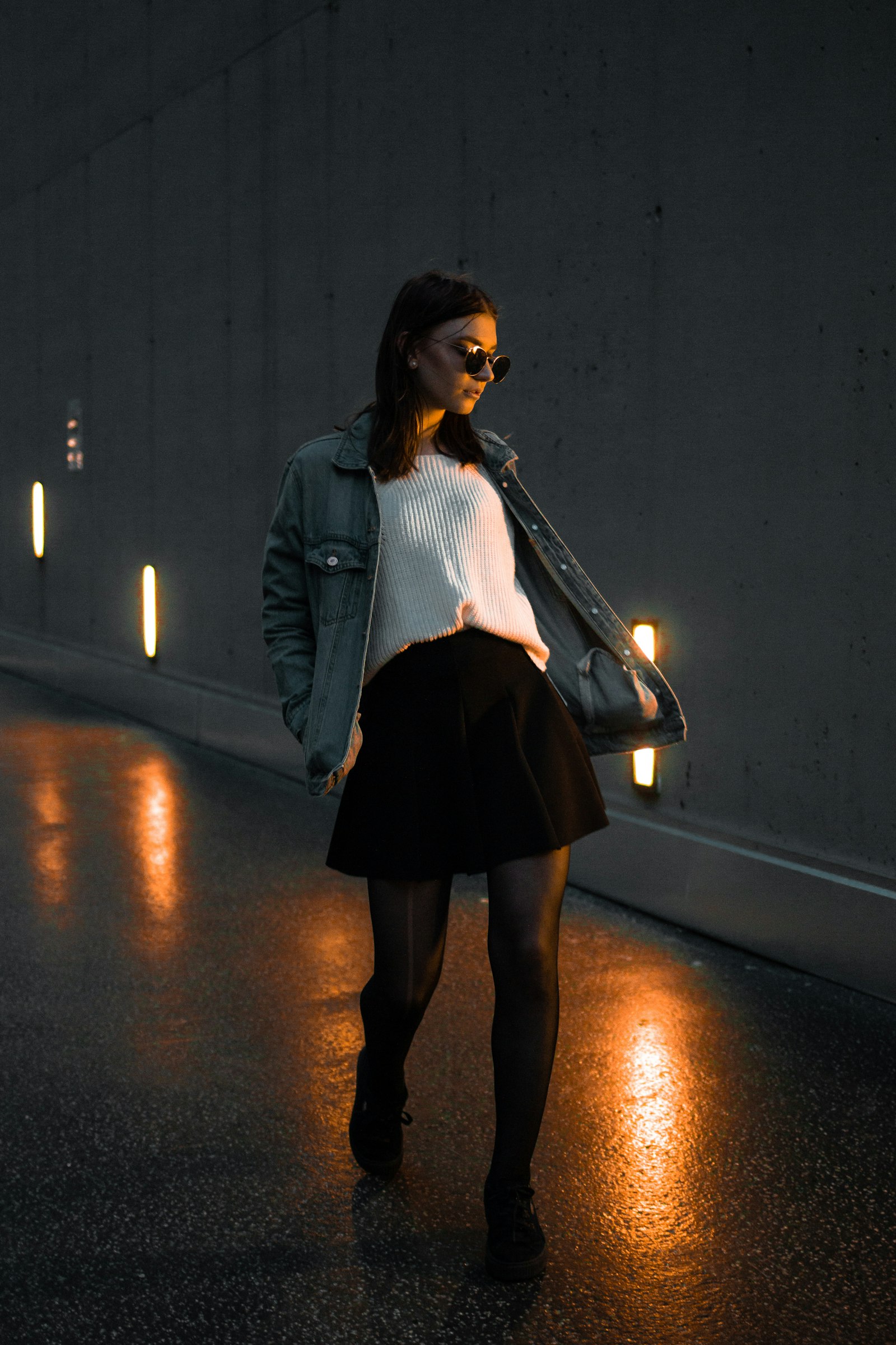 Canon EOS 70D + Canon EF 35mm F2 IS USM sample photo. Woman walking through concrete photography