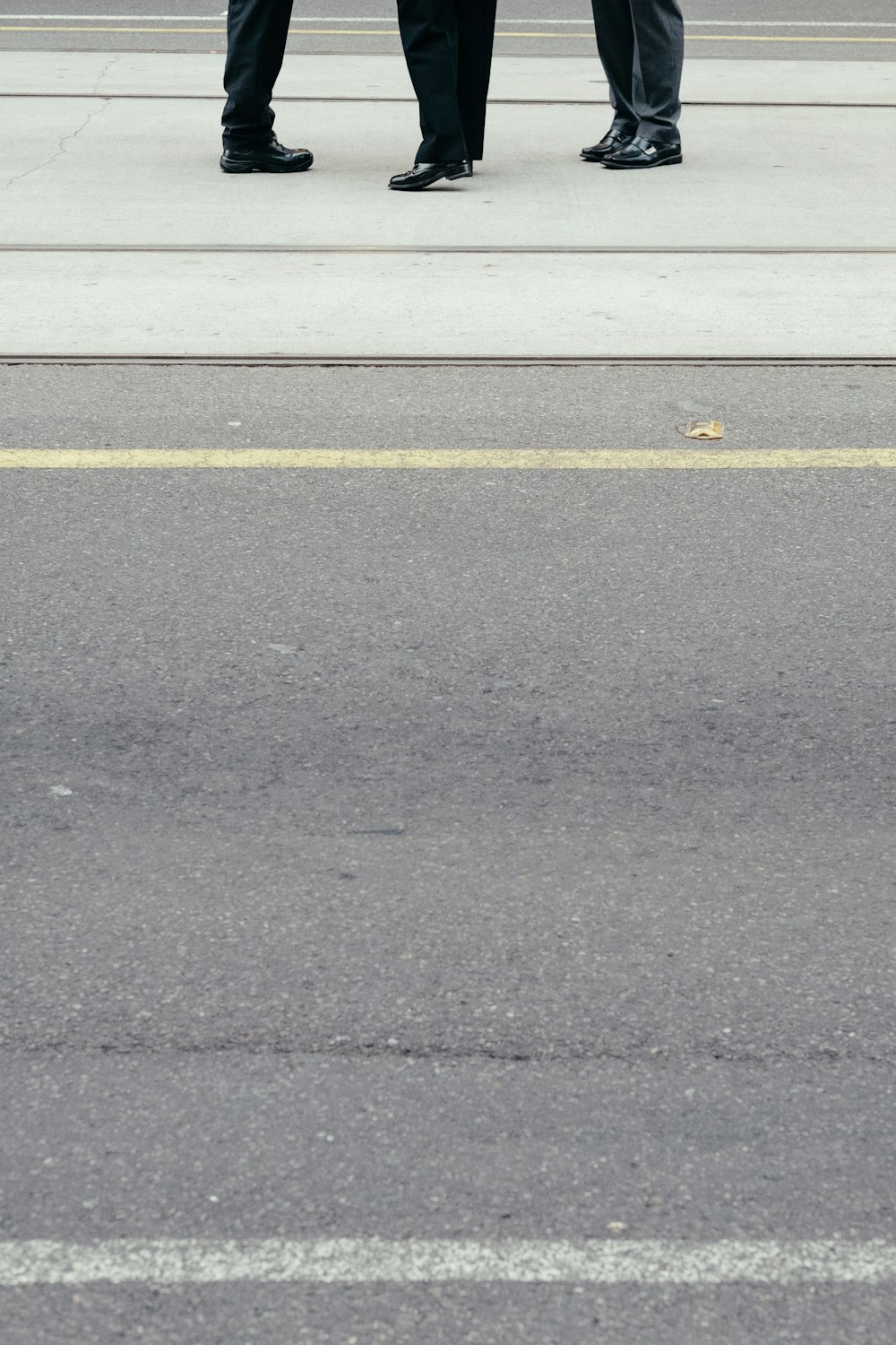 three person on road