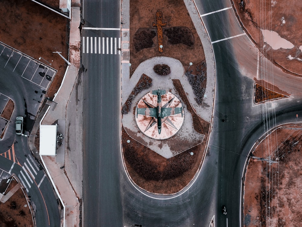 aerial photography of black road and plane