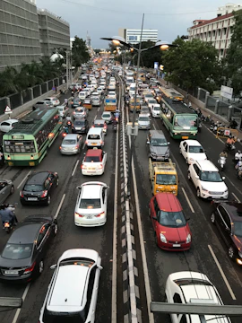 City streets bustling with Rise Car vehicles during rush hour.