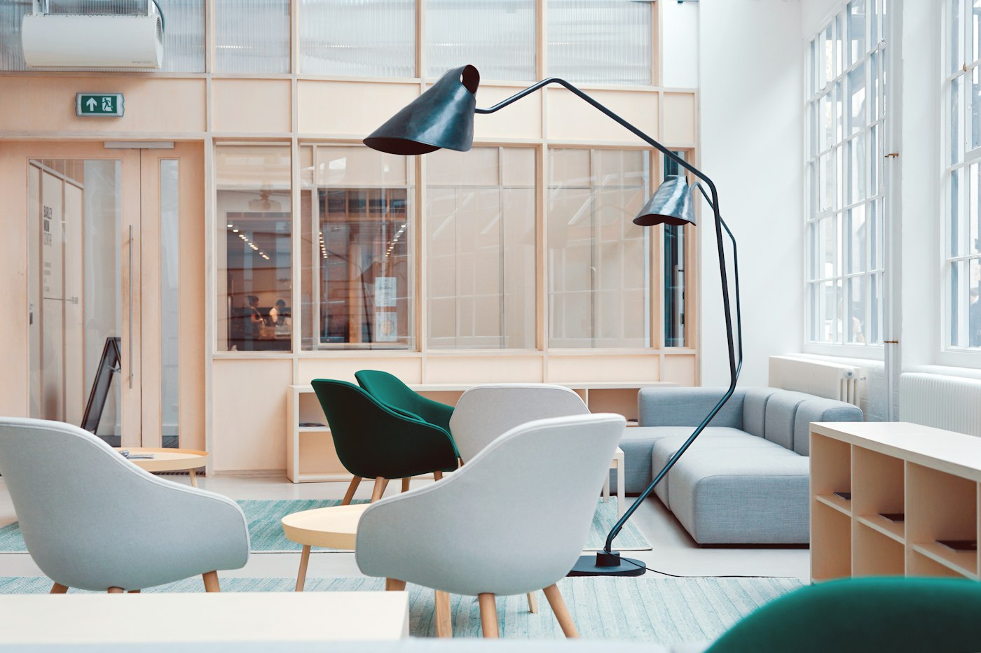 A bright office reception lounge with seating