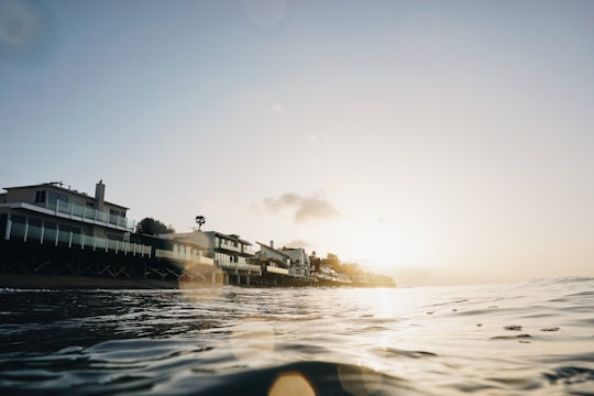 white building near shoreline at daytime in Malibu United States