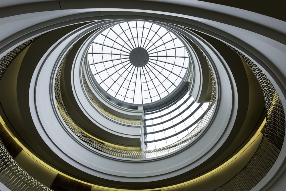 bottom view photo of spiral stair dome building